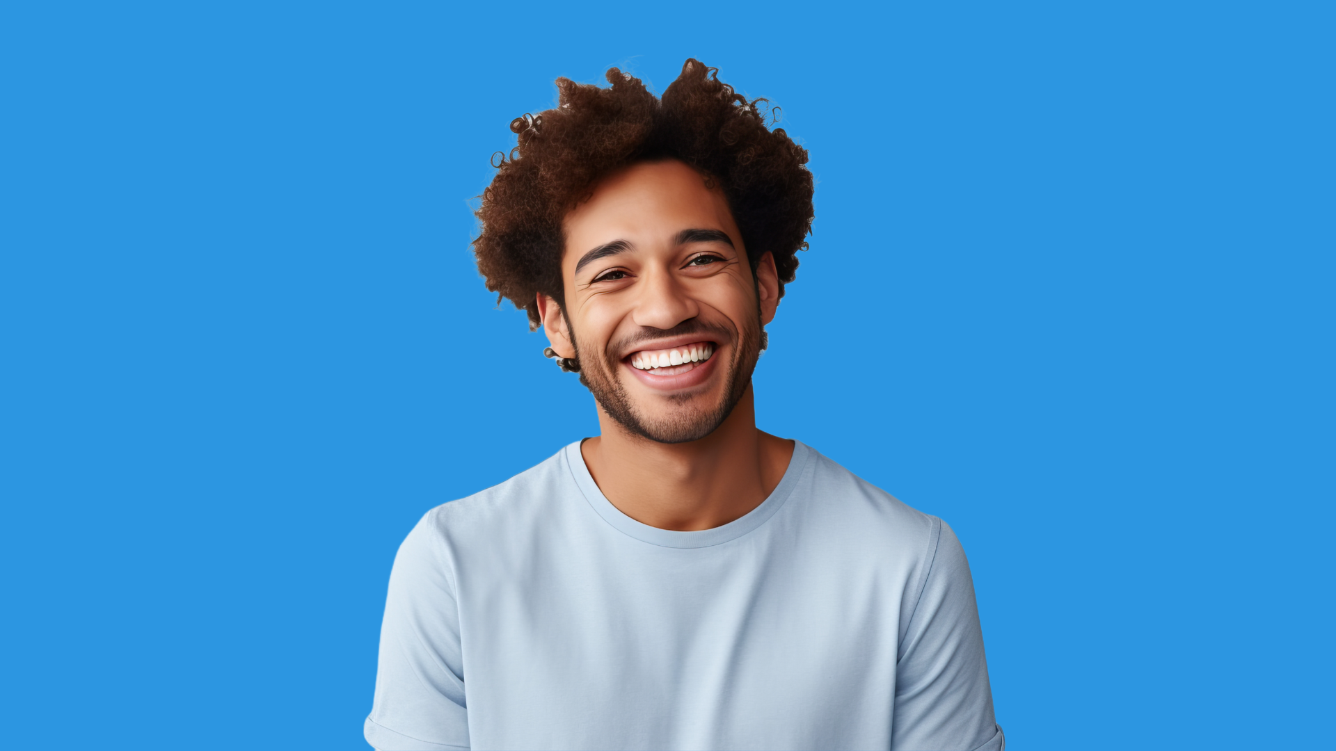 A middle aged man smiling for a picture.